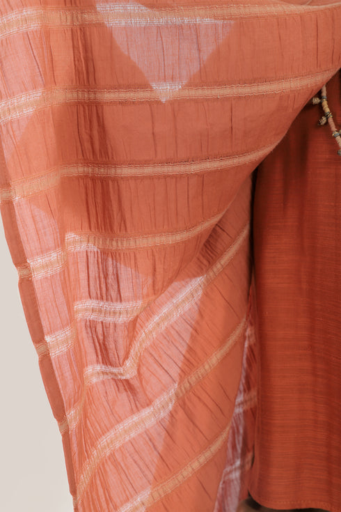 Striped coat with draped collar and long sleeves